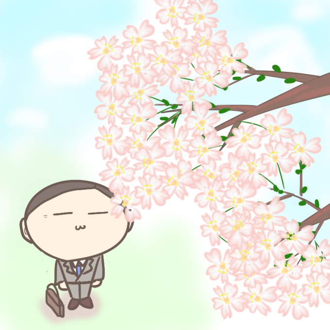 桜を見上げる人の良さそうなサラリーマン
